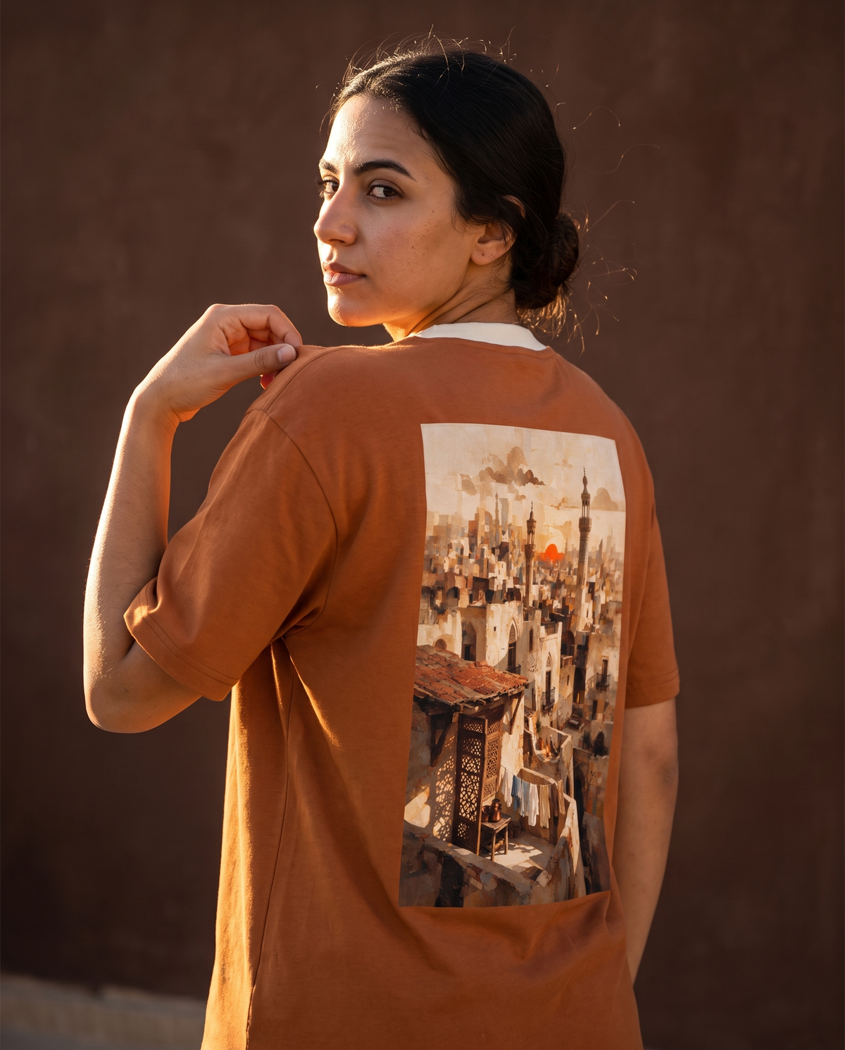 The Midtown Vibes Tee in Sunrise — back print on model