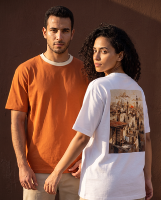The Midtown Vibes Tee in Sunrise — and in Sugar White — on two models, walking