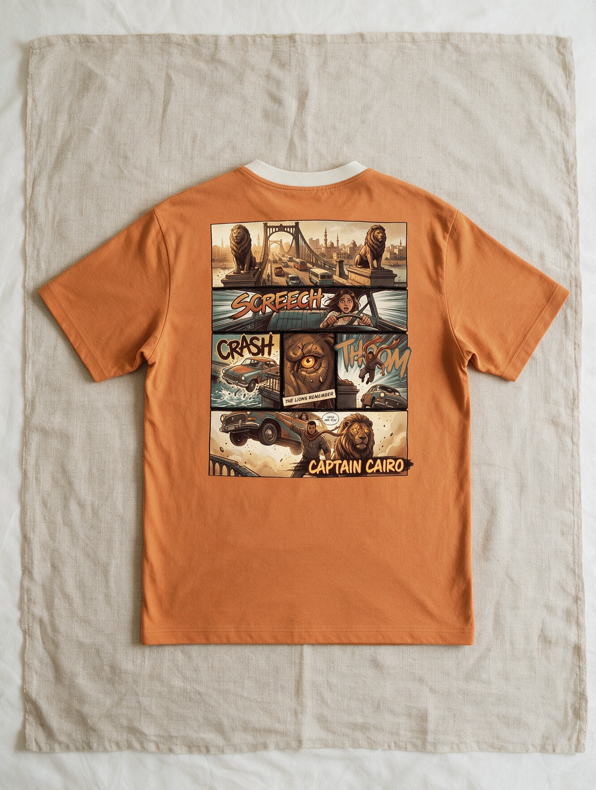 Captain Cairo Tee in Sunrise — comic print, laid flat on linen