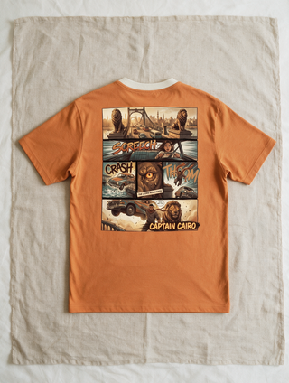 Captain Cairo Tee in Sunrise — comic print, laid flat on linen