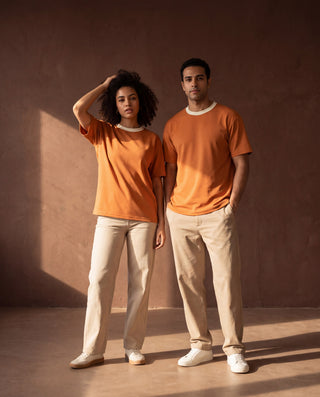 The Basic Tee in Sunrise — unisex, on two models